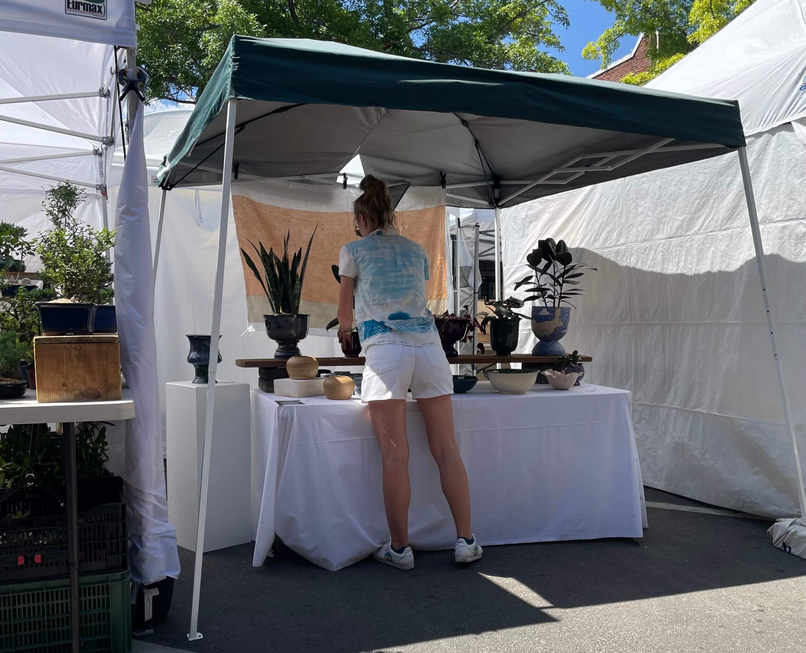 Sierra setting up her booth