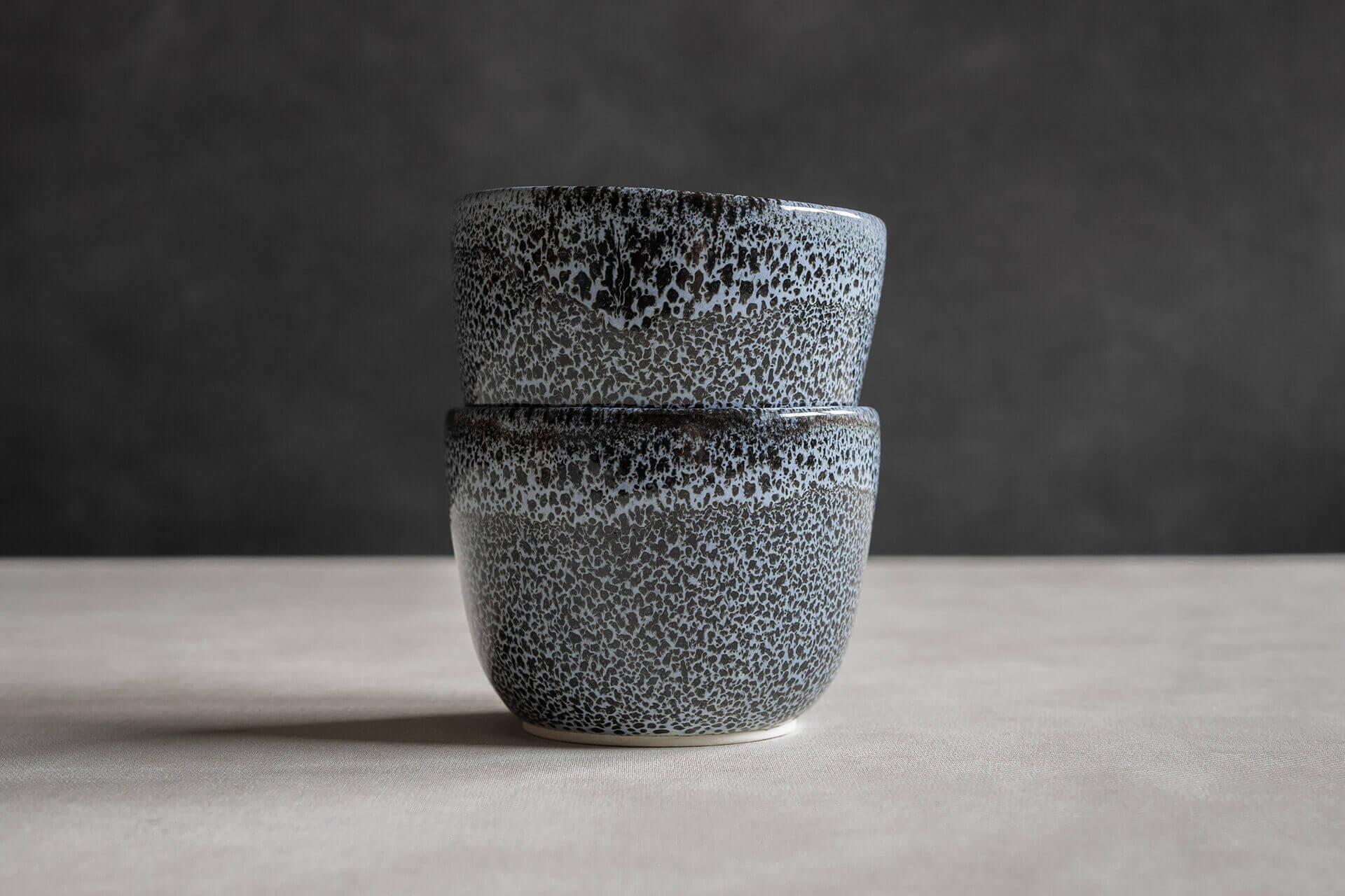 double stacked sipping buddy on a marble textured surface